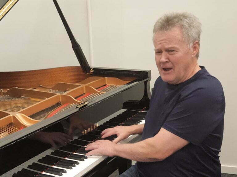 Bob Perry grooving at piano - Prestige Piano Services